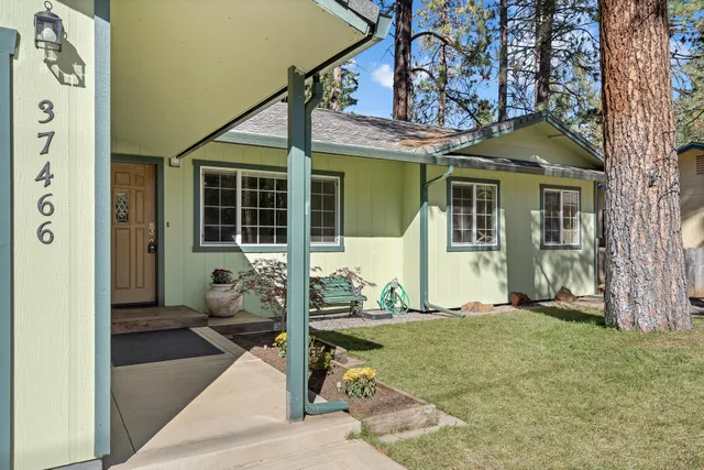 a front view of a house with a porch