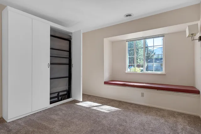 an empty room with windows