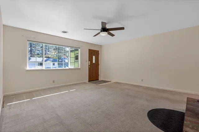 an empty room with windows