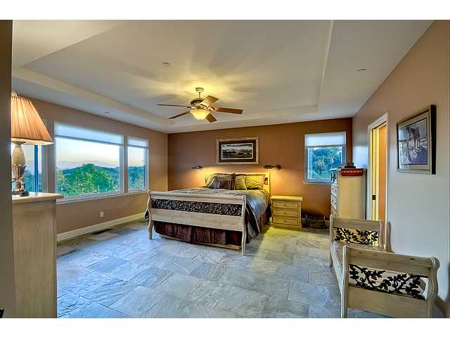 16591 Highland Valley Road Ramona, CA 92065 - Photo 17 of 25 Palatial entry level Master suite awaits you, complete with walk-in closet, and gorgeous sunrise views to greet you every morning.