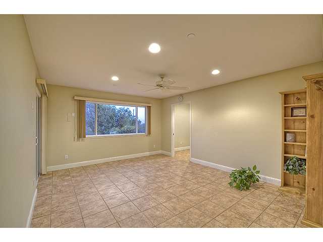 16591 Highland Valley Road Ramona, CA 92065 - Photo 21 of 25 "Master suite" #2. On lower level (7 steps down from entry foyer). Offers privacy, full ensuite bath and "potential" closet (not completed). Could also be craft room, classroom for those who home school. Served previously as artists studio & workout room