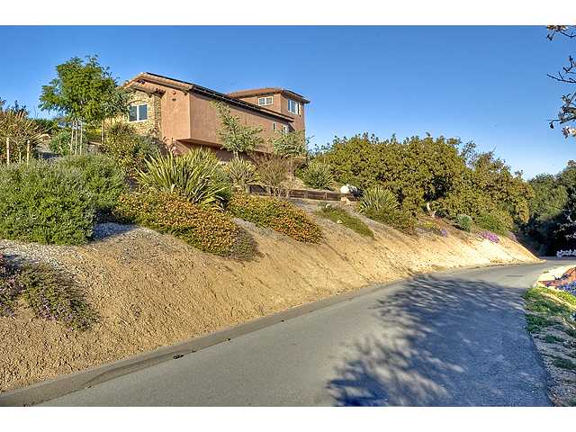 16591 Highland Valley Road Ramona, CA 92065 - Photo 4 of 25 A hillside view of the back side of house~~this hillside transforms into a brilliant array of flowering blossoms in the spring!