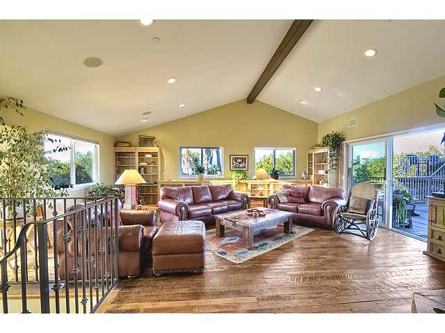 16591 Highland Valley Road Ramona, CA 92065 - Photo 5 of 25 Amazingly warm and wonderful family room with views out every window. Wired for surround sound. Look at those gorgeous wood floors!