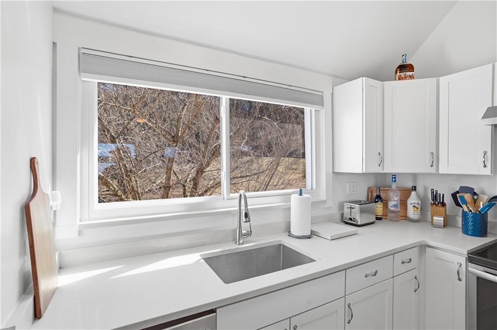 7 Ridgemead Fields Drive Verona, PA 15147 - Photo 16 of 42 The double window over the kitchen sink offers a panorama view.