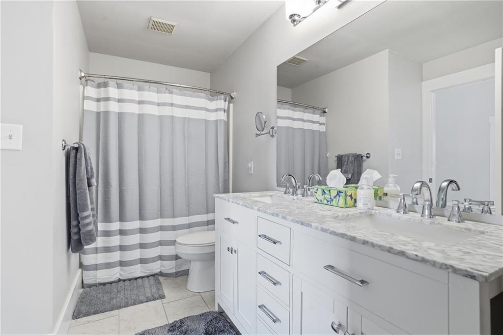7 Ridgemead Fields Drive Verona, PA 15147 - Photo 28 of 42 Modern white cabinets and countertops in the bathroom!