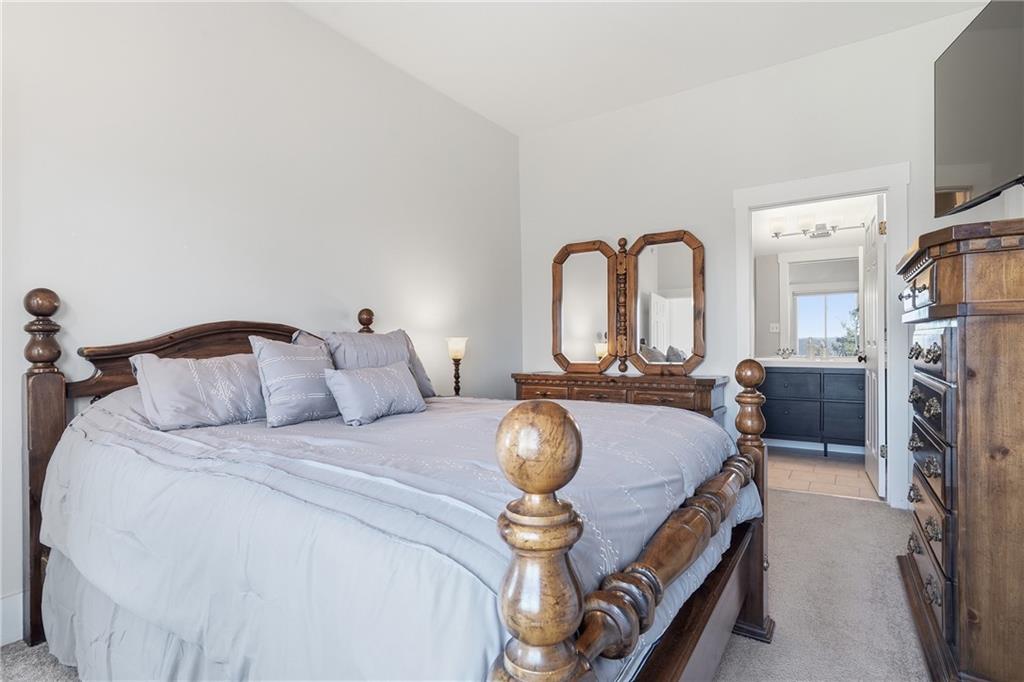 7 Ridgemead Fields Drive Verona, PA 15147 - Photo 33 of 42 Through the bedroom, you'll come to a full ensuite bathroom.