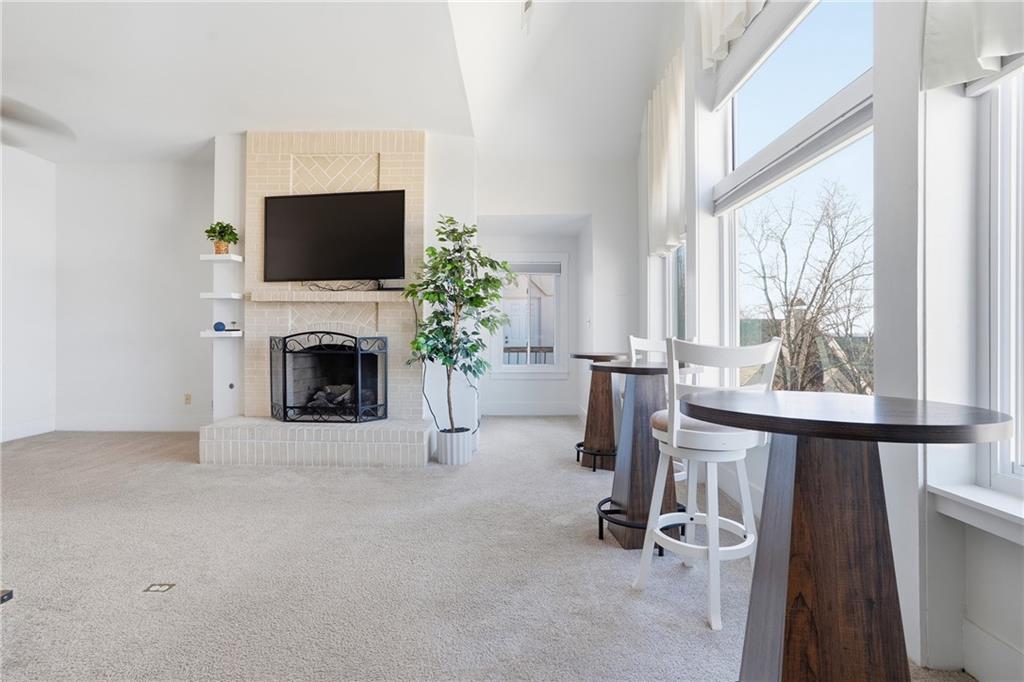 7 Ridgemead Fields Drive Verona, PA 15147 - Photo 6 of 42 The current owner makes full use of the beautiful view from the cathedral windows with his dining option.