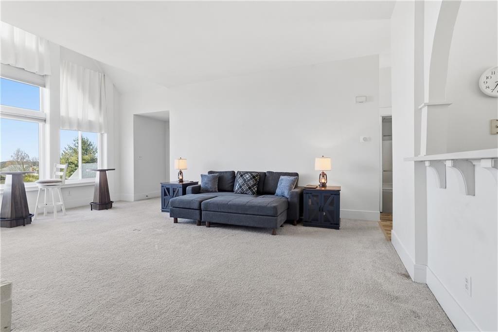 7 Ridgemead Fields Drive Verona, PA 15147 - Photo 9 of 42 The pass-through from the kitchen can be used as a dining area with the addition of bar stools.