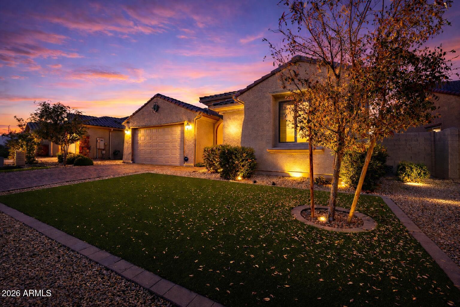 8616 West Rancho Drive Glendale, AZ 85305 - Photo 2 of 19 Twilight side view