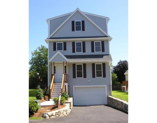 4 Knowles Farm Road Arlington, MA 02474 - Photo 1 of 12 a front view of a house with garden