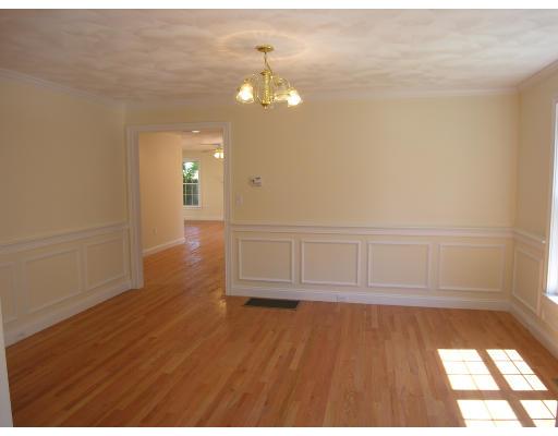 4 Knowles Farm Road Arlington, MA 02474 - Photo 5 of 12 wooden floor in an empty room