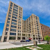 a view of a building with a street