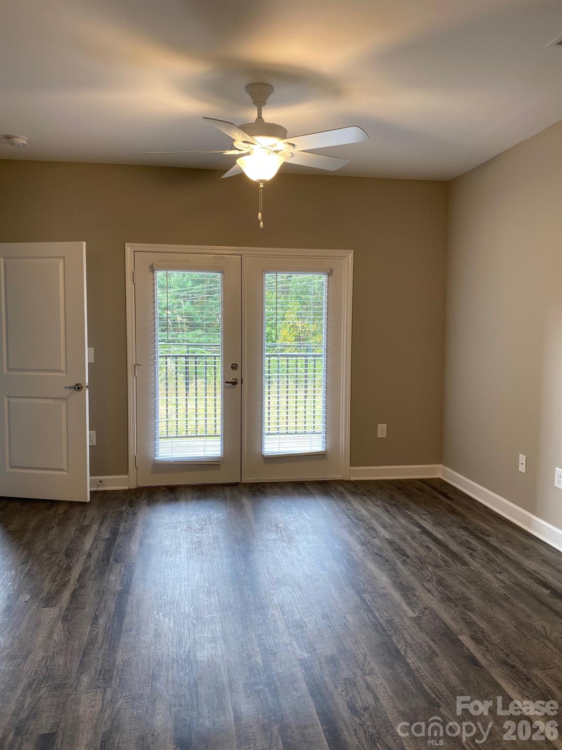 90 Riverside Drive Hickory, NC 28601 - Photo 13 of 15 a view of an empty room with wooden floor and a window