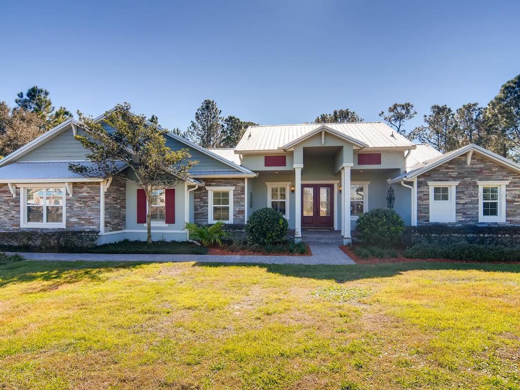 416 Long And Winding Road Groveland, FL 34737 - Photo 1 of 1 Exterior Front Elevation