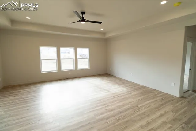 a bathroom with a toilet sink and shower