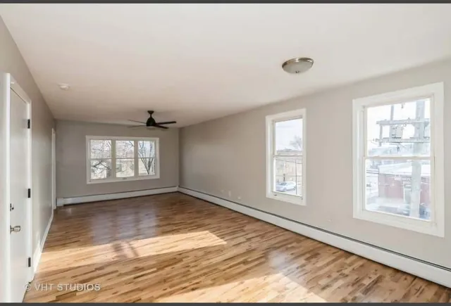 a view of an empty room and window