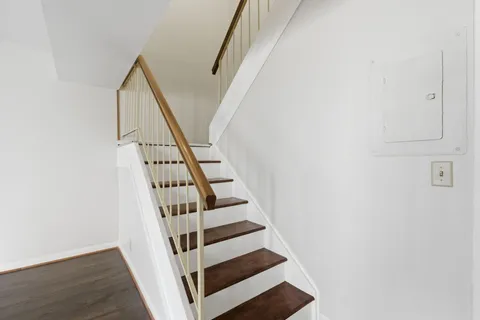a view of entryway with wooden floor