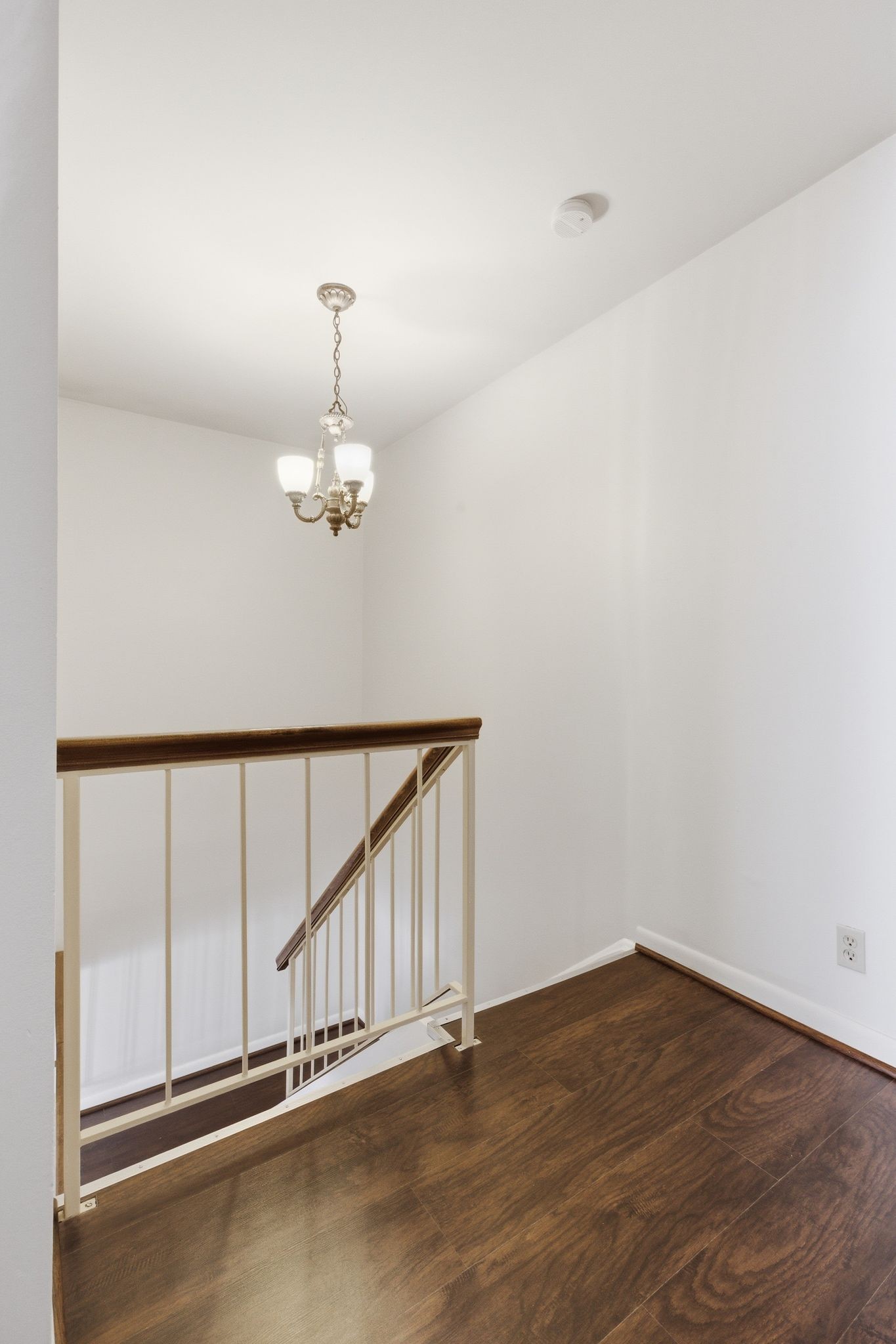 2116 Hobbs Road, Unit G6 Nashville, TN 37215 - Photo 16 of 30 an empty room with wooden floor fan and window