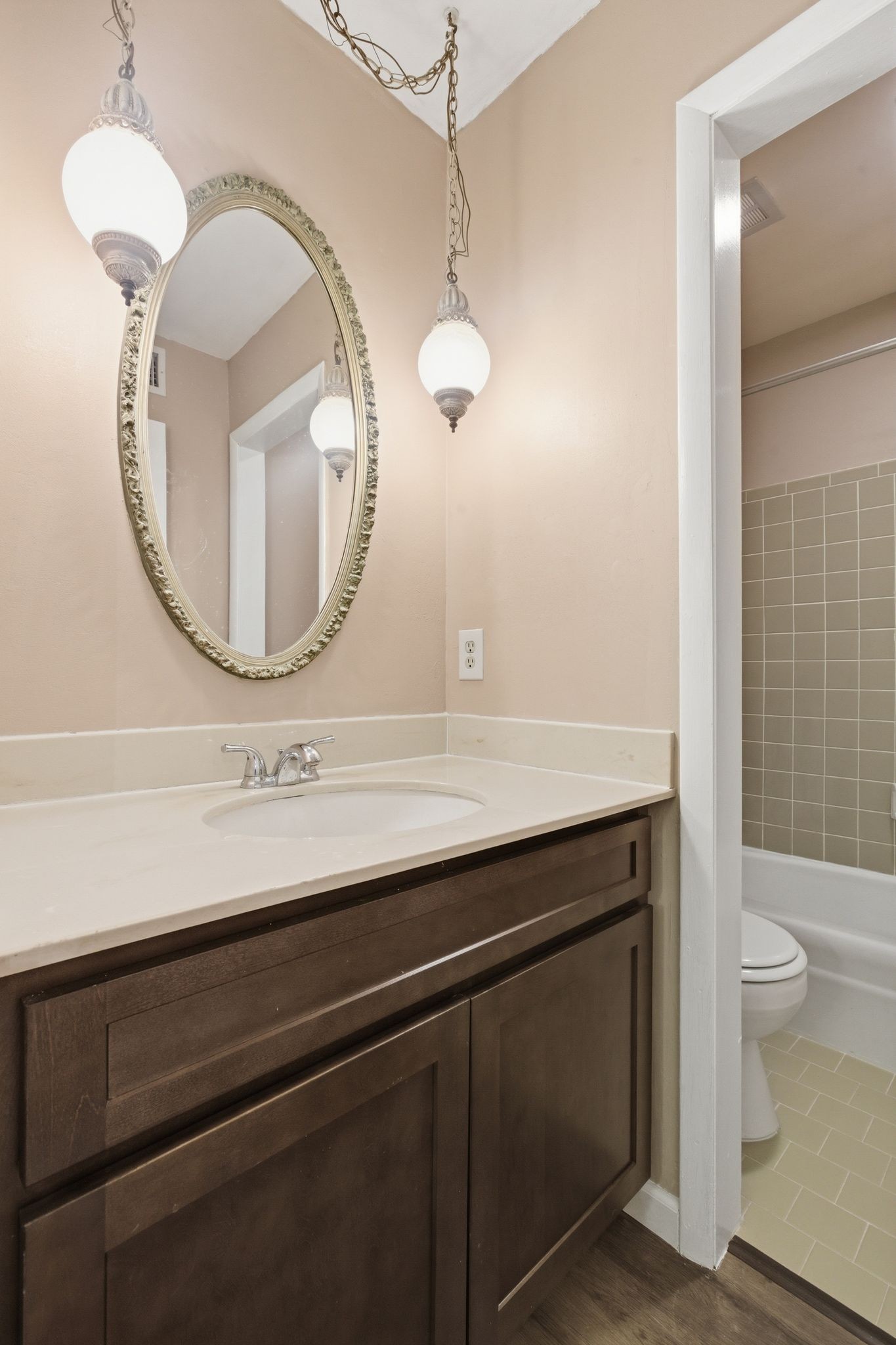2116 Hobbs Road, Unit G6 Nashville, TN 37215 - Photo 17 of 30 a bathroom with a sink a toilet and a mirror