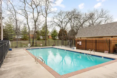 swimming pool with outdoor seating