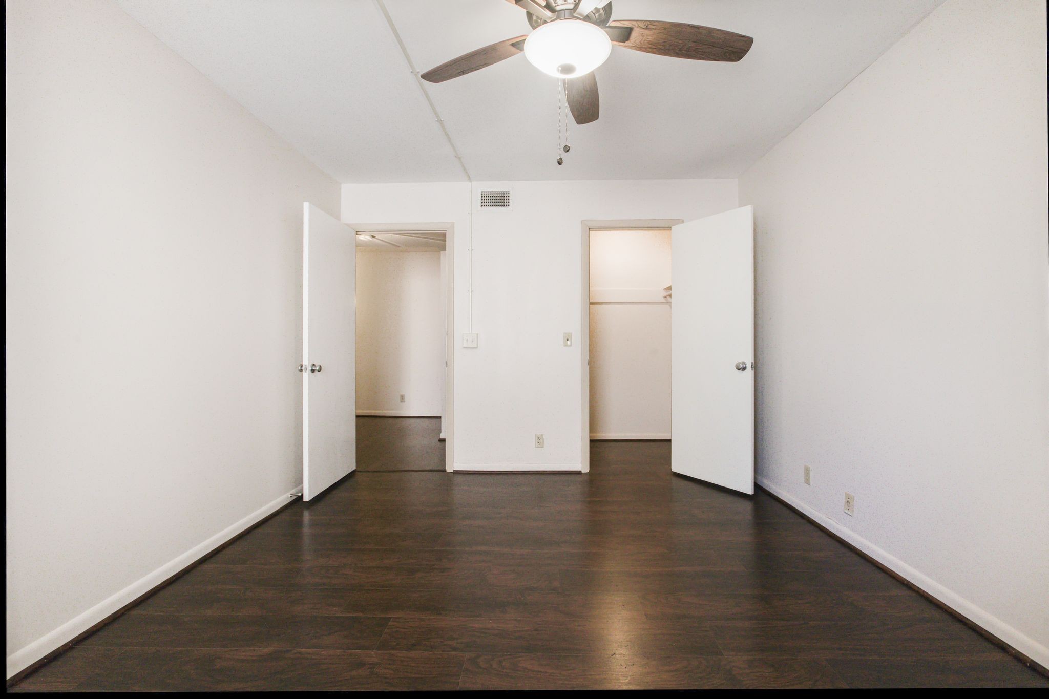 2116 Hobbs Road, Unit G6 Nashville, TN 37215 - Photo 26 of 30 an empty room with wooden floor and windows