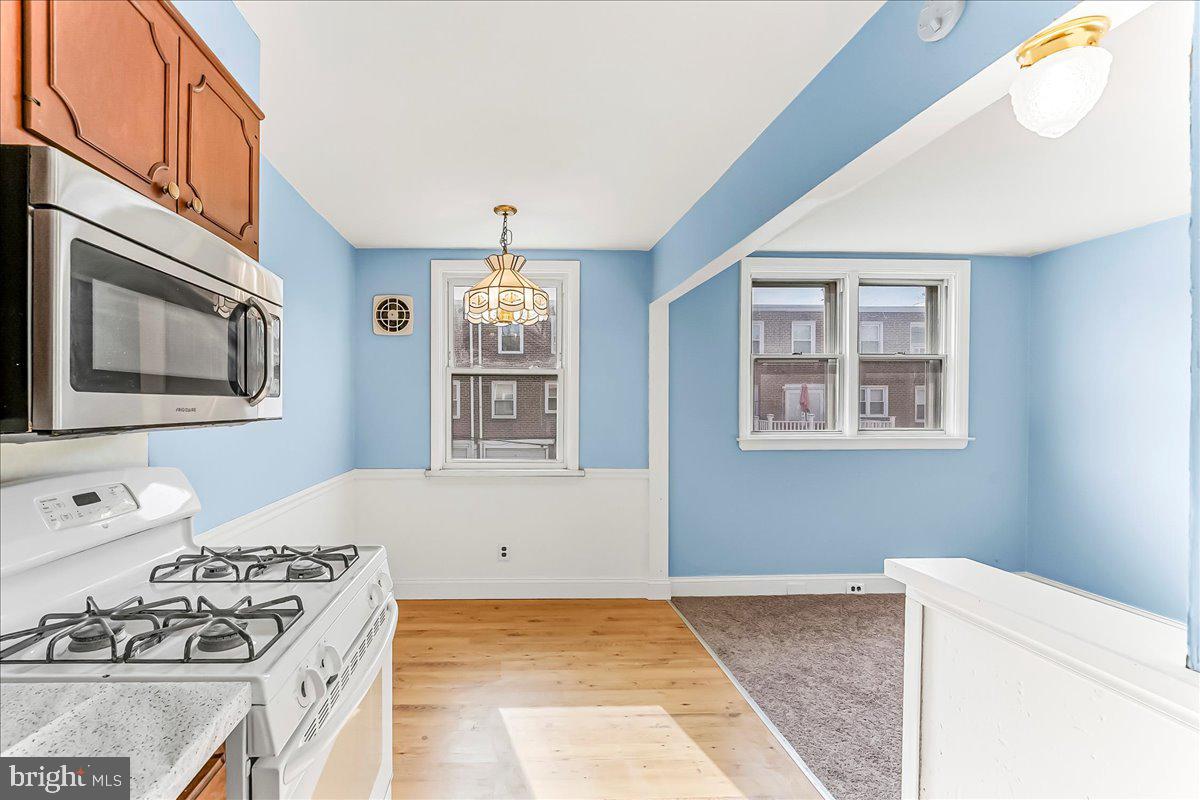 324 West Rively Avenue Glenolden, PA 19036 - Photo 14 of 27 a kitchen with a stove and a refrigerator