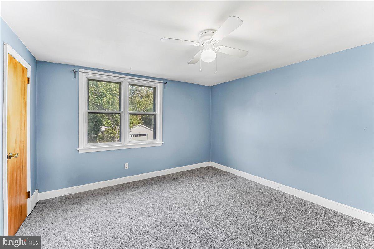 324 West Rively Avenue Glenolden, PA 19036 - Photo 21 of 27 an empty room with windows and fan