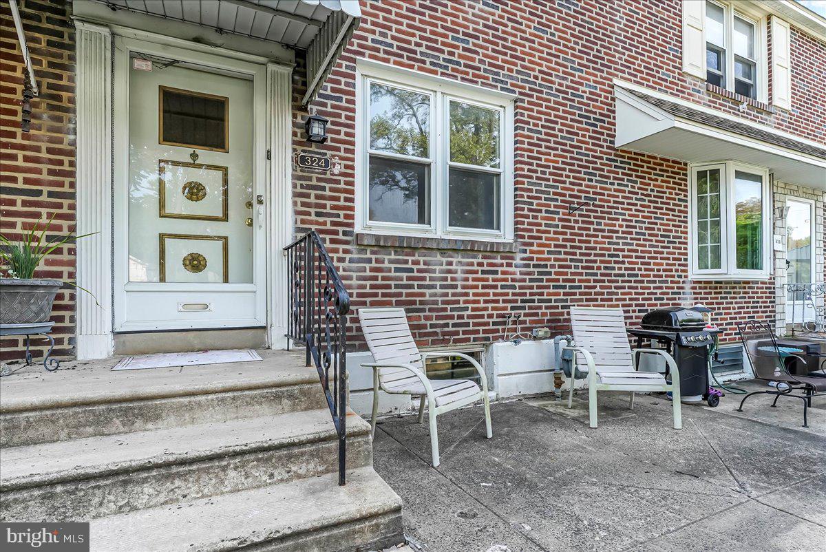324 West Rively Avenue Glenolden, PA 19036 - Photo 3 of 27 a front view of a house with outdoor seating