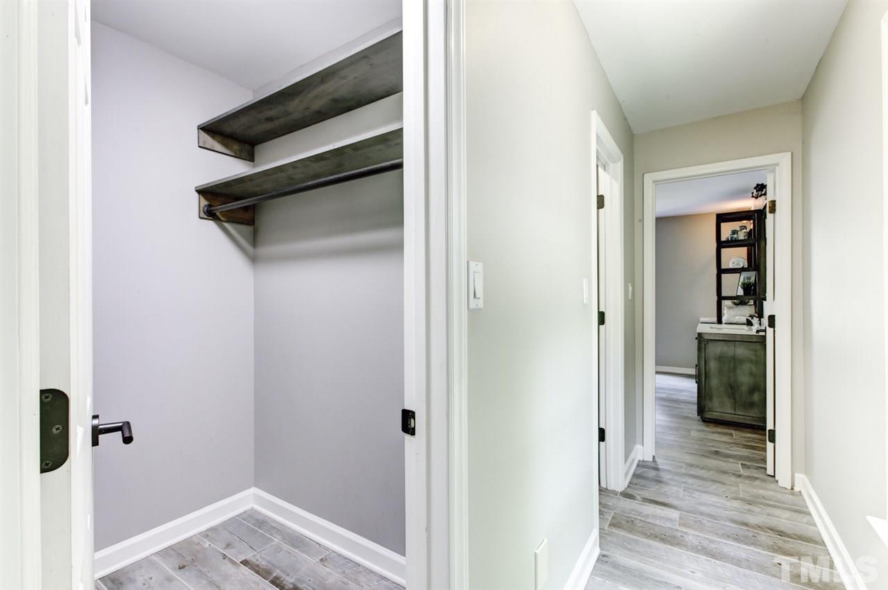 8228 Ridgeback Road Apex, NC 27523 - Photo 15 of 30 a view of a walk in closet