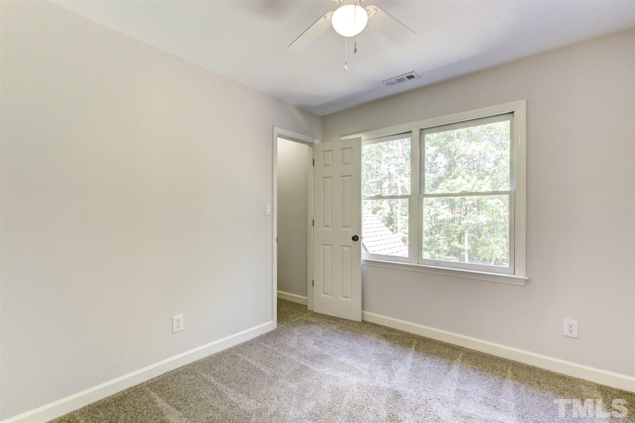 8228 Ridgeback Road Apex, NC 27523 - Photo 19 of 30 an empty room with a window