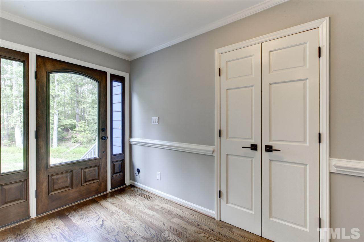 8228 Ridgeback Road Apex, NC 27523 - Photo 3 of 30 a view of an empty room with a window