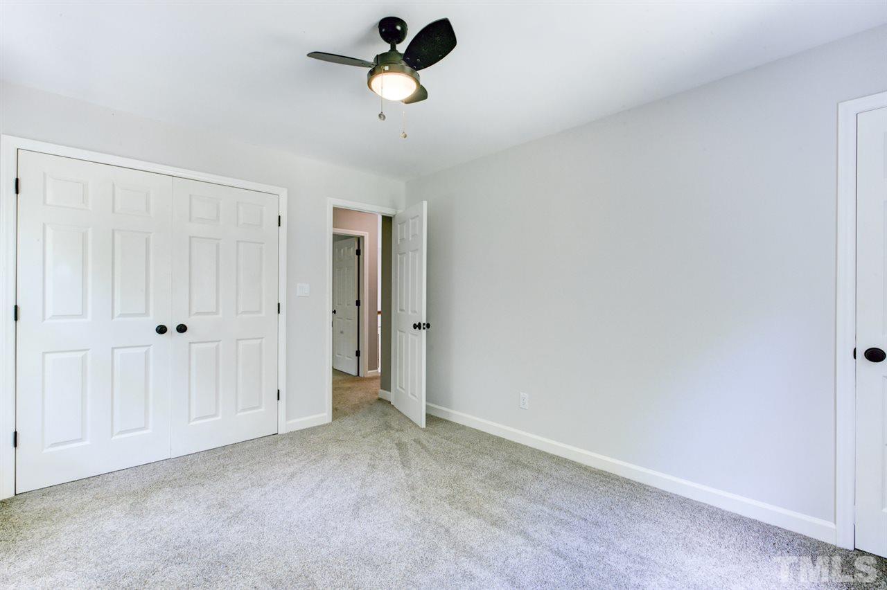 8228 Ridgeback Road Apex, NC 27523 - Photo 22 of 30 wooden floor in an empty room