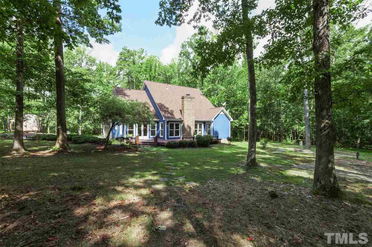 8228 Ridgeback Road Apex, NC 27523 - Photo 26 of 30 a view of a house with a yard