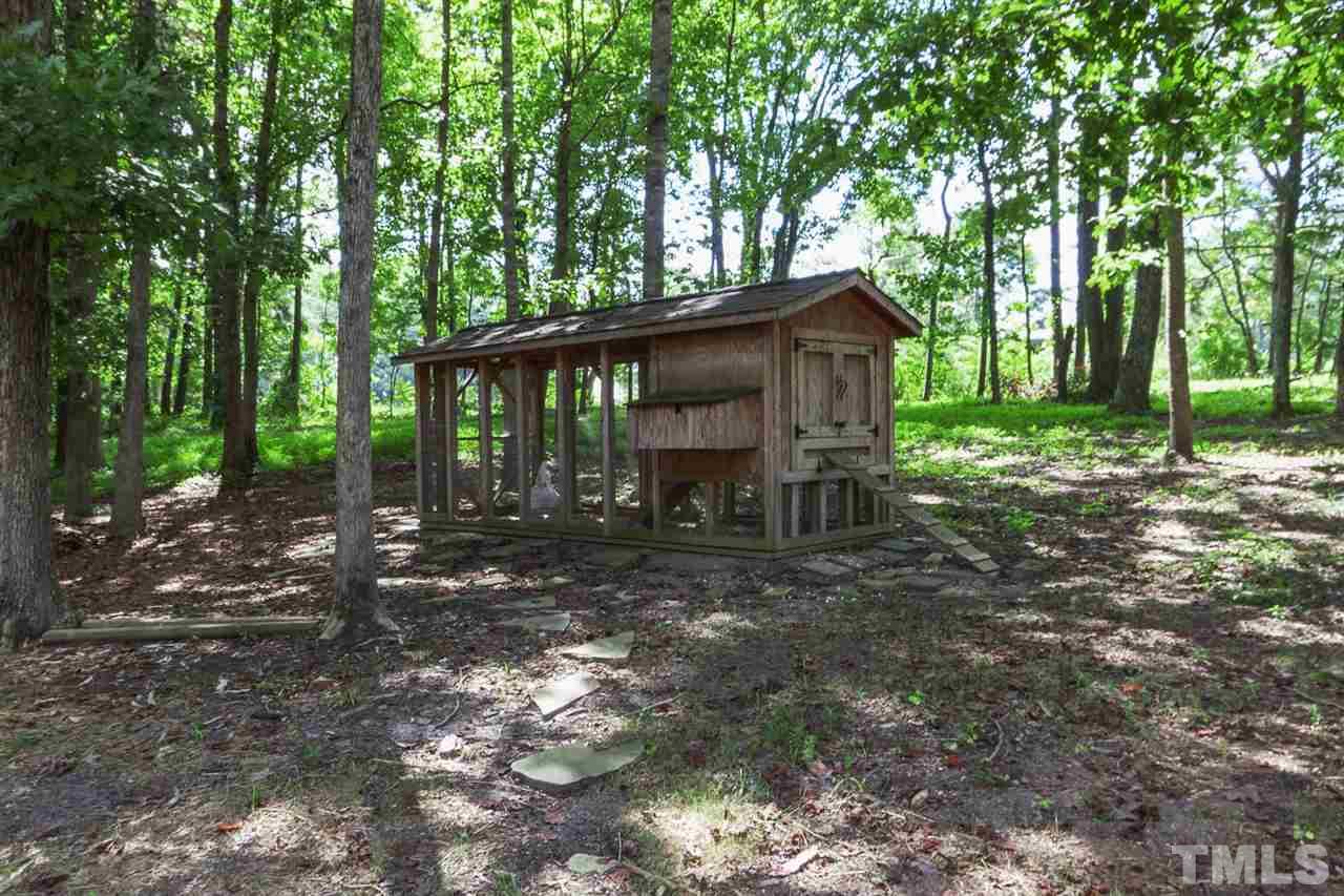 8228 Ridgeback Road Apex, NC 27523 - Photo 28 of 30 a view of a house with a yard