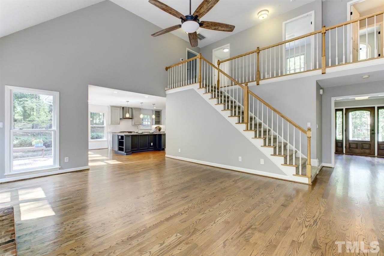 8228 Ridgeback Road Apex, NC 27523 - Photo 10 of 30 a view of an entryway with wooden floor