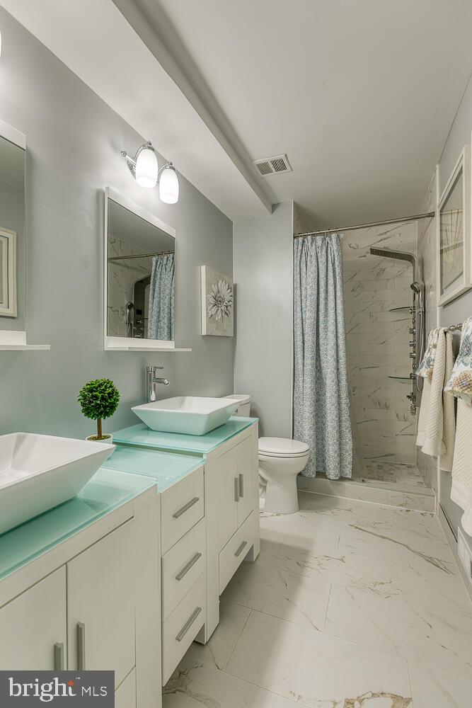 6415 Charnwood Street Springfield, VA 22152 - Photo 28 of 47 Ceramic tile