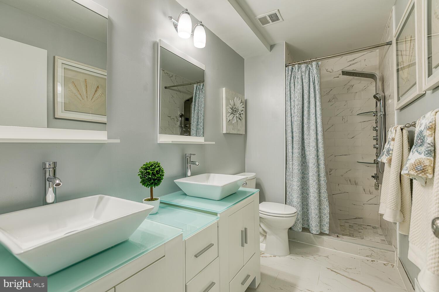 6415 Charnwood Street Springfield, VA 22152 - Photo 6 of 47 Updated bathroom with double vanity