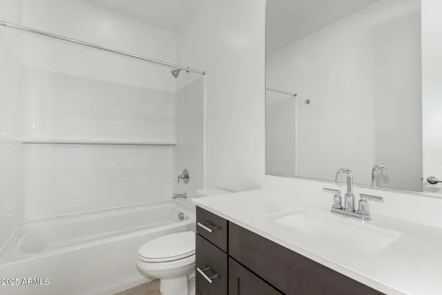 a bathroom with a sink a toilet and a bathtub