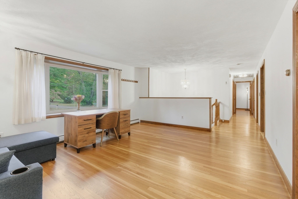 210 Winn Street Burlington, MA 01803 - Photo 14 of 33 a view of a livingroom with furniture and a window