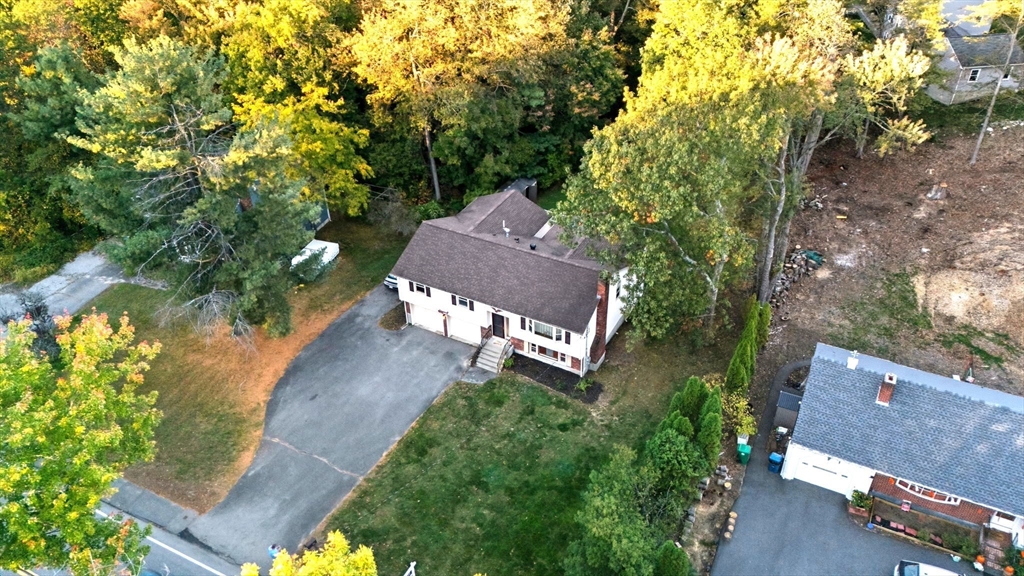 210 Winn Street Burlington, MA 01803 - Photo 3 of 33 an aerial view of a house with a yard