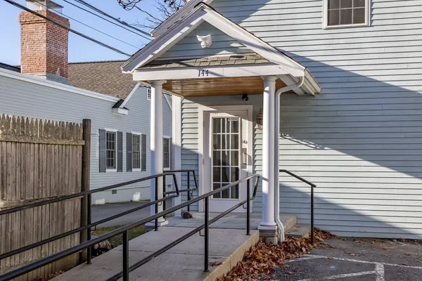 a view of a porch with wooden stairs