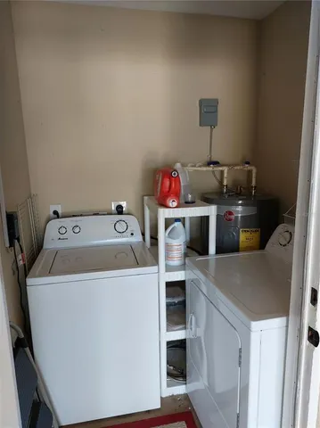 a utility room with dryer and washer