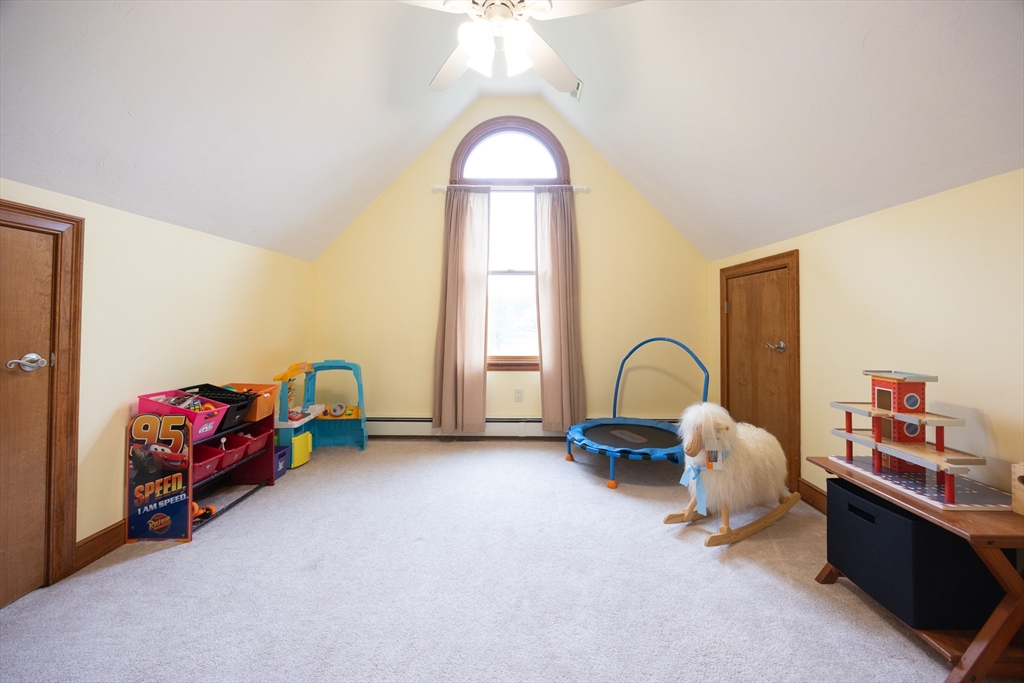 70 Azalea Way Hanson, MA 02341 - Photo 39 of 42 a bedroom with a bed and a large window