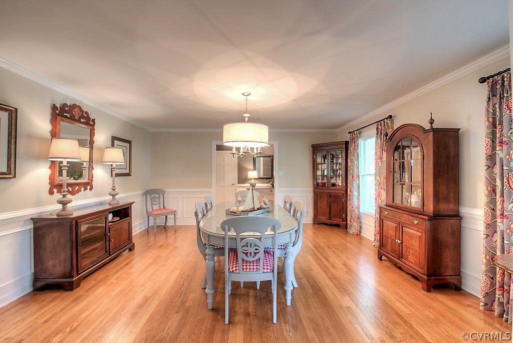 10800 Ramshorn Road Midlothian, VA 23113 - Photo 8 of 49 a view of a dining room with furniture window and wooden floor