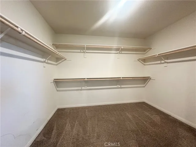 a view of an empty walk in closet