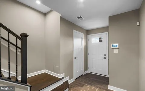 a view of a hallway with entryway