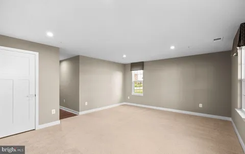 a view of a brick building from a balcony