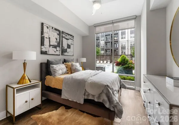 a kitchen with stainless steel appliances granite countertop a stove refrigerator and microwave