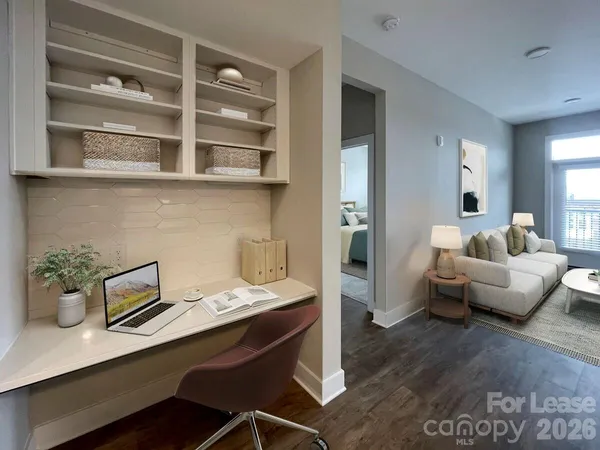 a view of a balcony with furniture