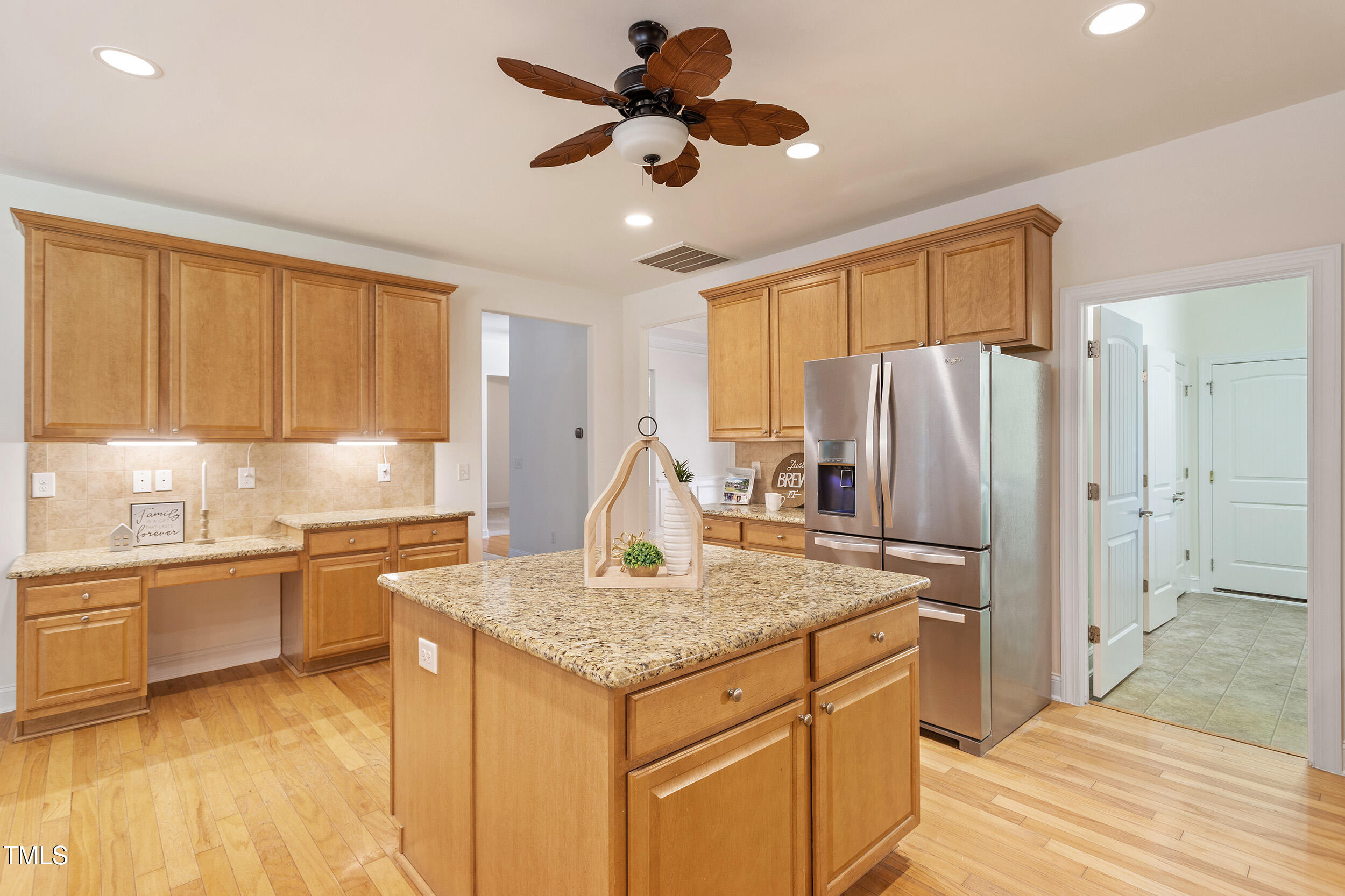 46 Spring Haven Lane Willow Spring, NC 27592 - Photo 11 of 45 a kitchen with stainless steel appliances granite countertop a sink stove and refrigerator